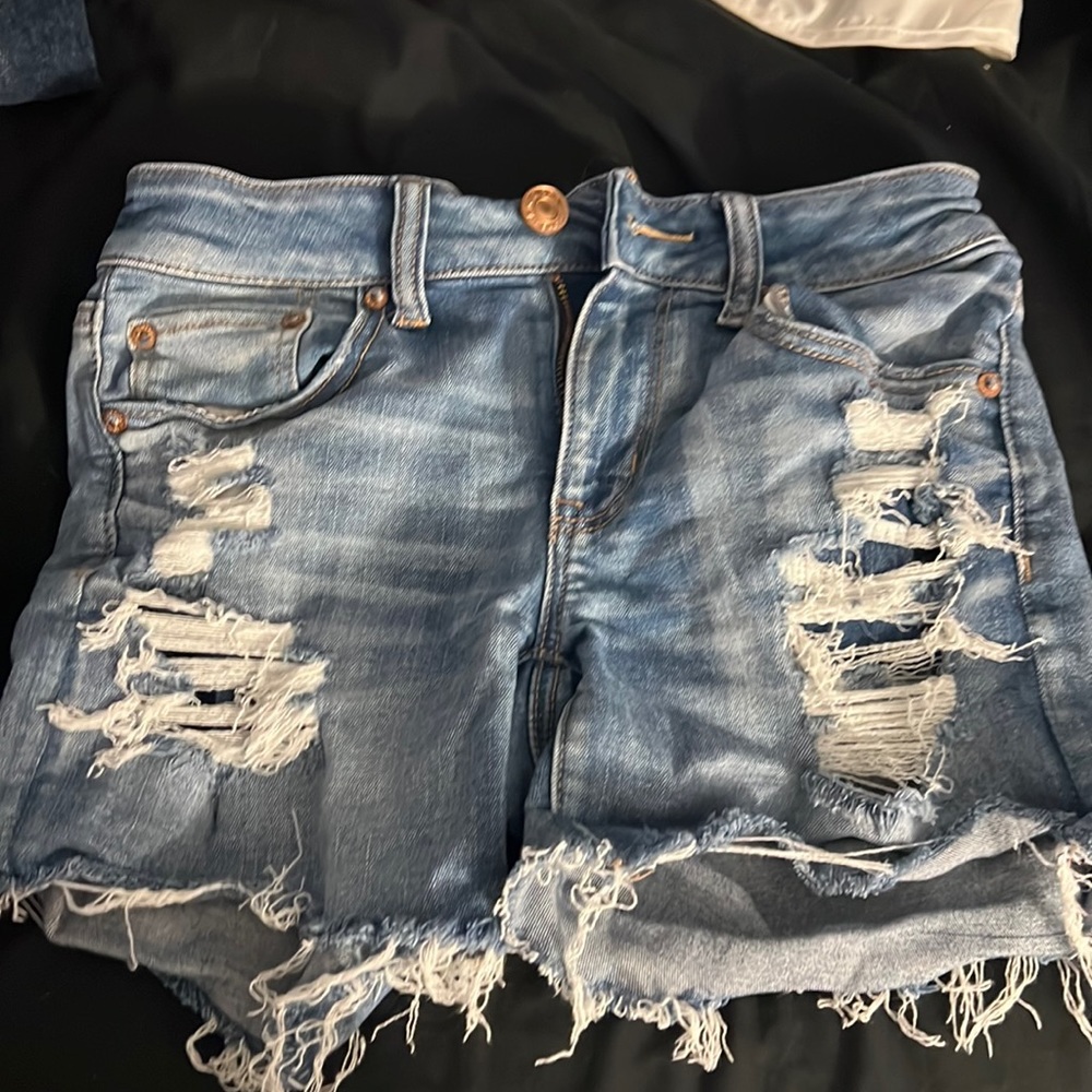 Patched blue shorts